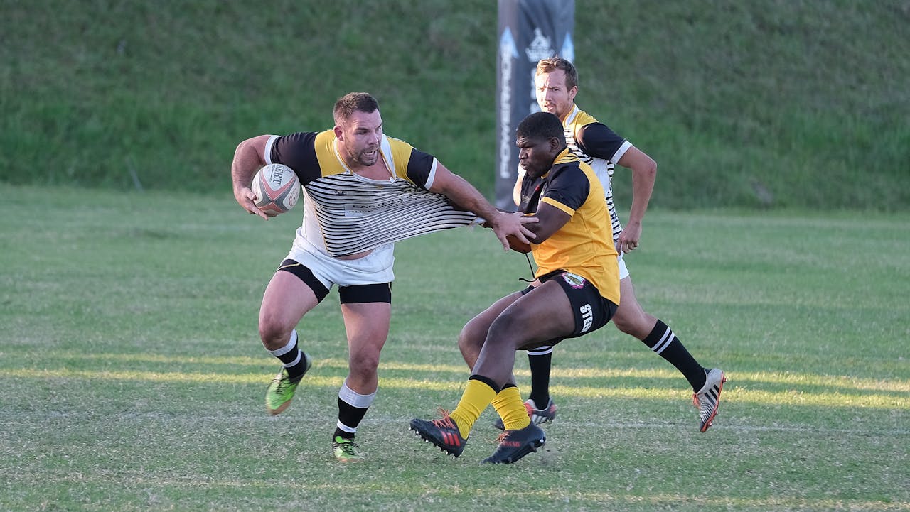 A player fending off a defender